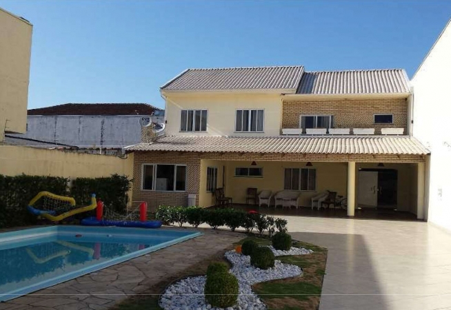 Terreno com Residência - Rua Des. Antonio de Paula nº 691 - Boqueirão - Área do terreno: 562,50m². Área construída: 240,00m².